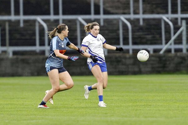 Ballyroan's Kate Whelan looks to block Marie Byrne's (St Conleth's) kick Photo: David Maher Ballyroan's Kate Whelan looks to block Marie Byrne's (St Conleth's) kick Photo: David Maher