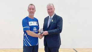 <p>Men's Golden Masters Wallball All-Ireland final runner-up Kevin Brennan (Laois) being presented with his medal by GAA Handball President Conor McDonnell </p> <p>Men's Golden Masters Wallball All-Ireland final runner-up Kevin Brennan (Laois) being presented with his medal by GAA Handball President Conor McDonnell </p>